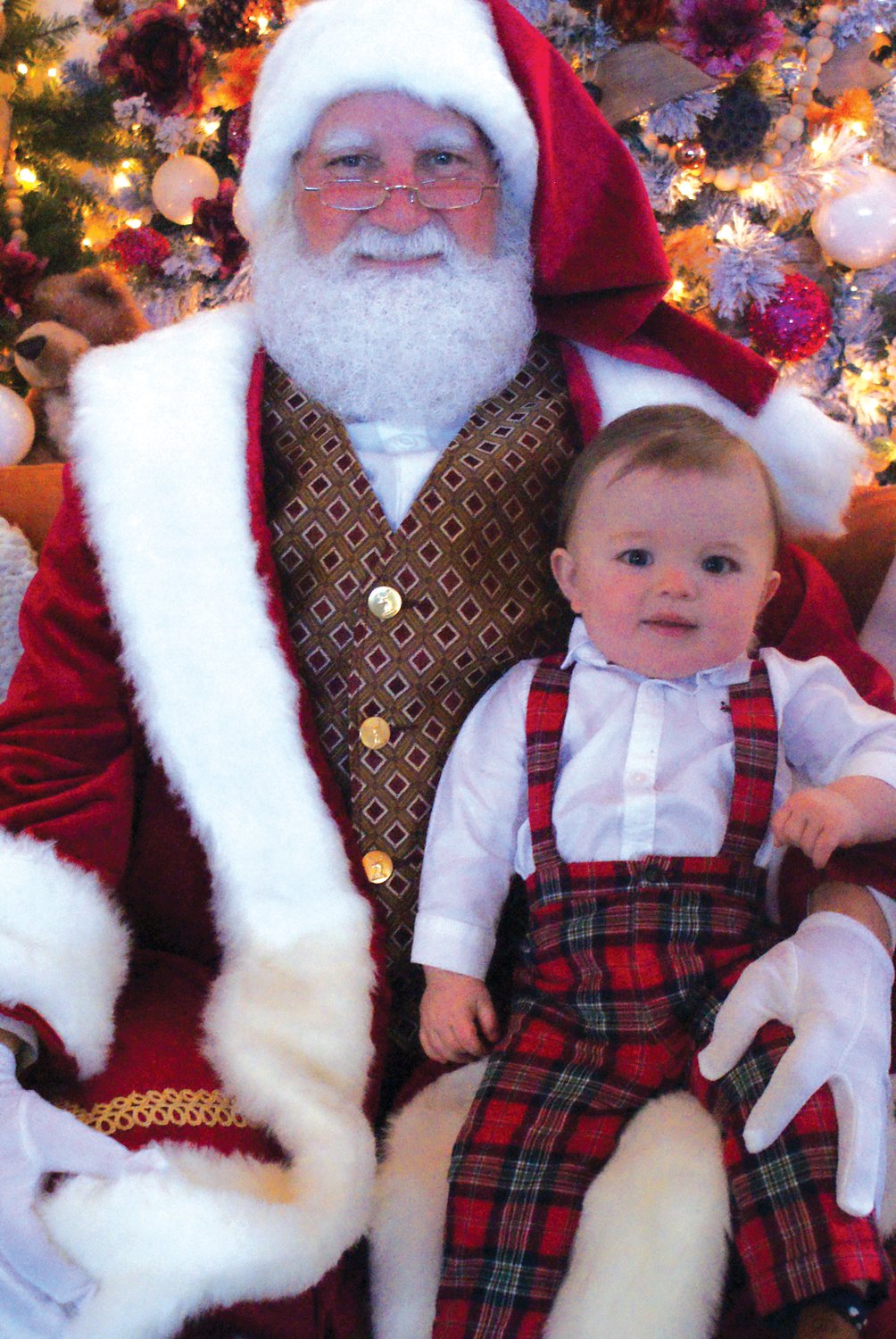 HIS FIRST CHRISTMAS: Ten-month-old Presley Forsythe celebrated his first Christmas with a visit to Santa at Garden City Center this past Saturday.